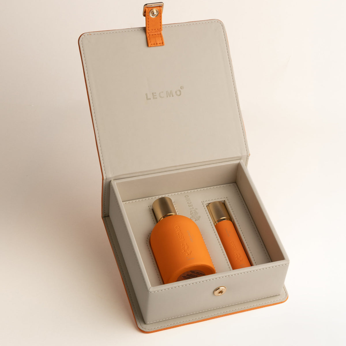 Lecmo Orangy caixa aberta com travel